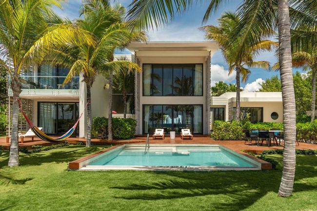 Villa suite privée de l'Andaz Mayakoba Resort Riviera Maya avec piscine privée et hamac